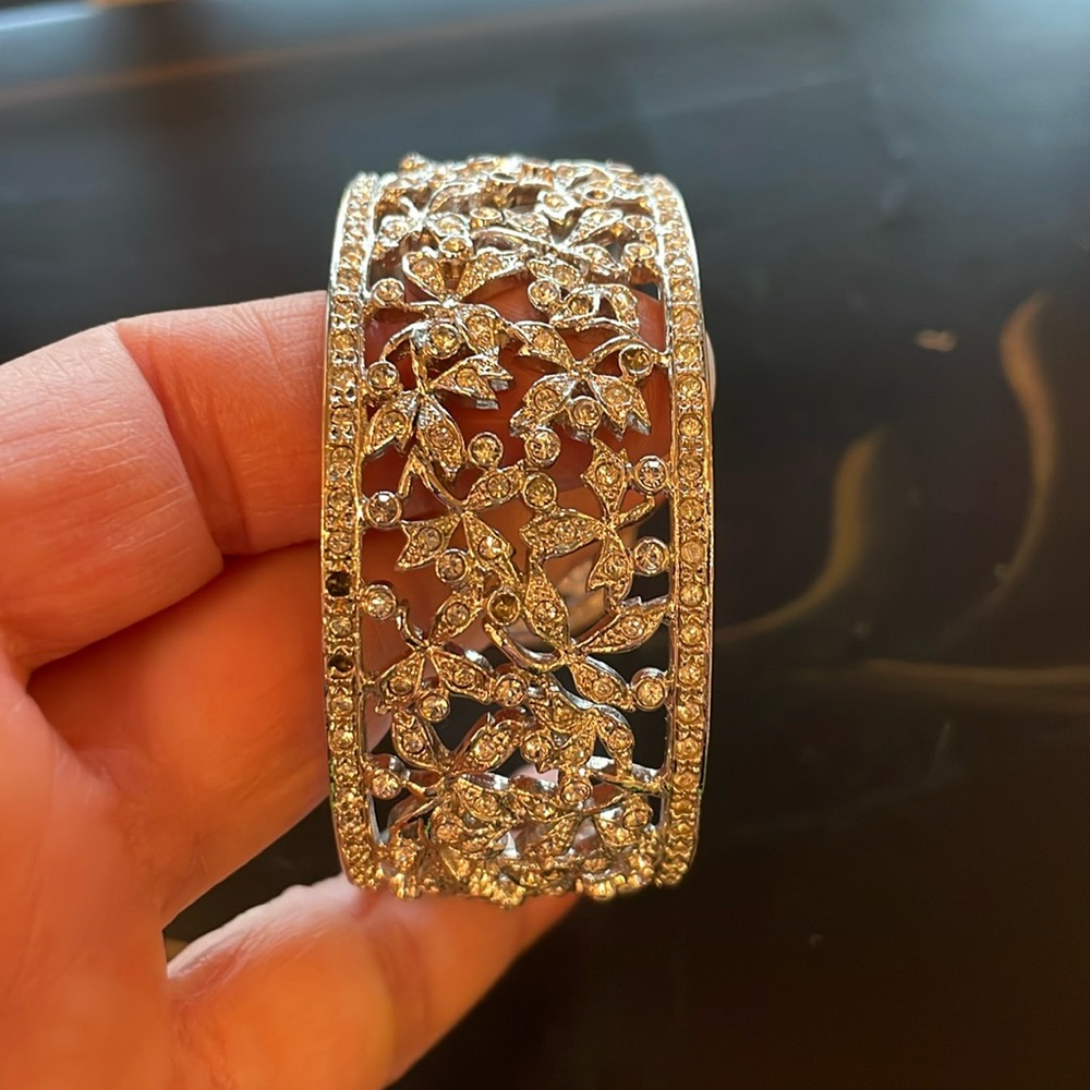 Vintage Rhinestone cuff bracelet 8 tiny stones missing. Bought at Nieman Marcus